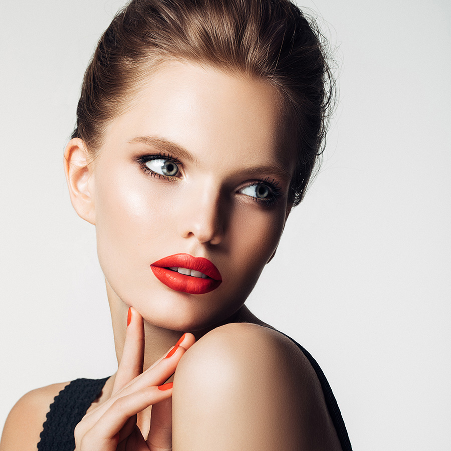Young woman with red lipstick