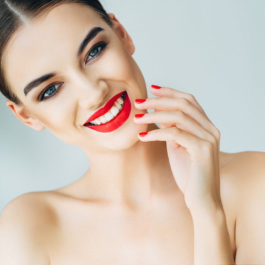 young woman with nice skin and red lipstick
