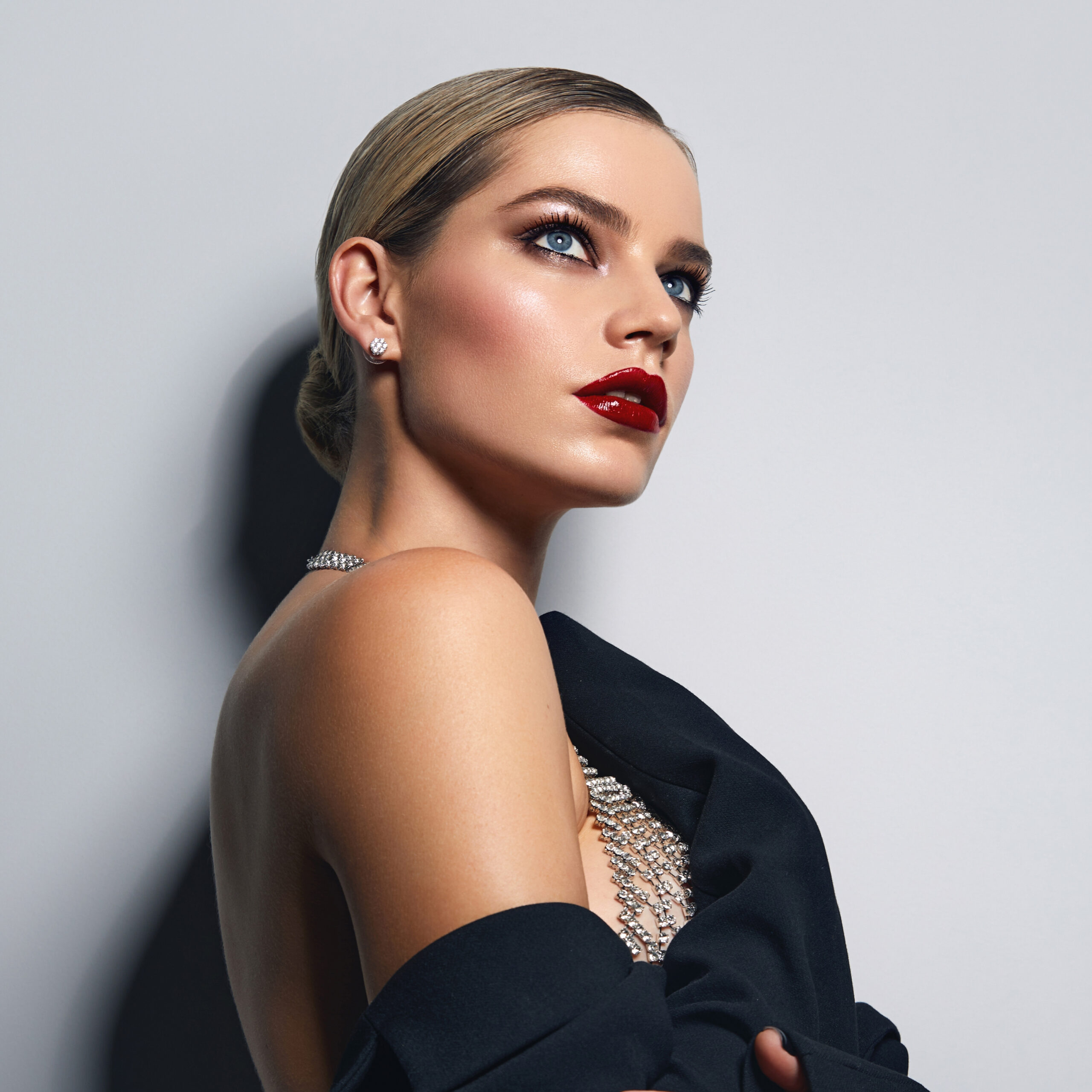 Young woman in black with red lipstick